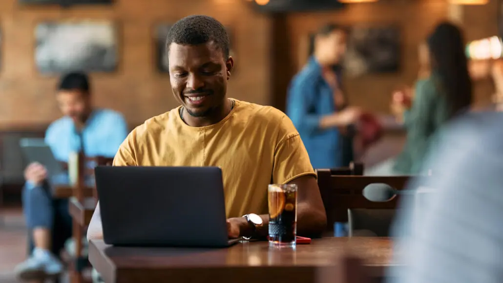 Adult student working in coffee shop