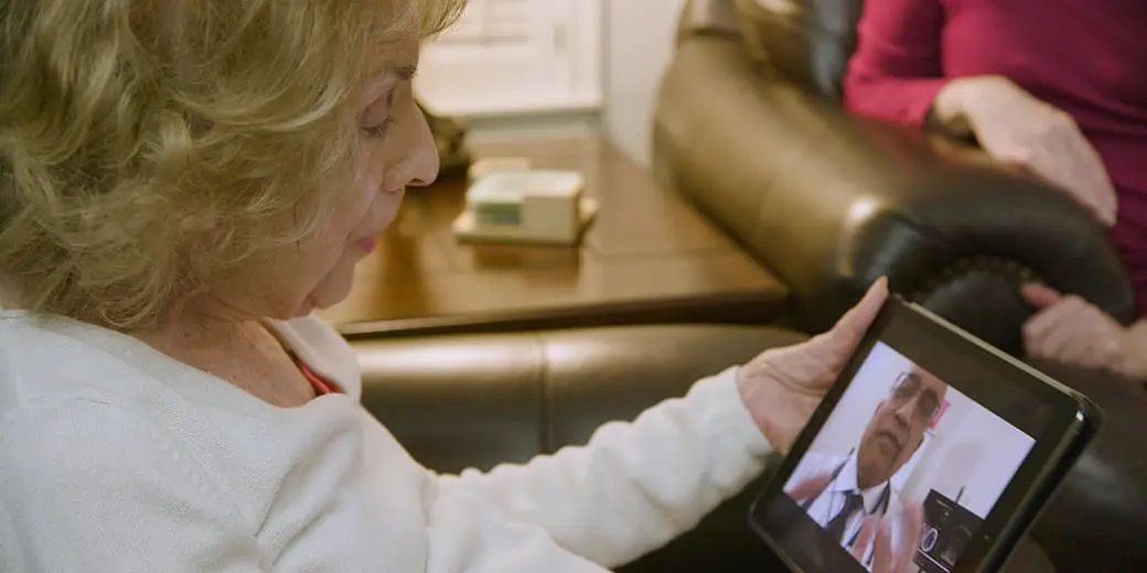 Mature woman viewing healthcare website.