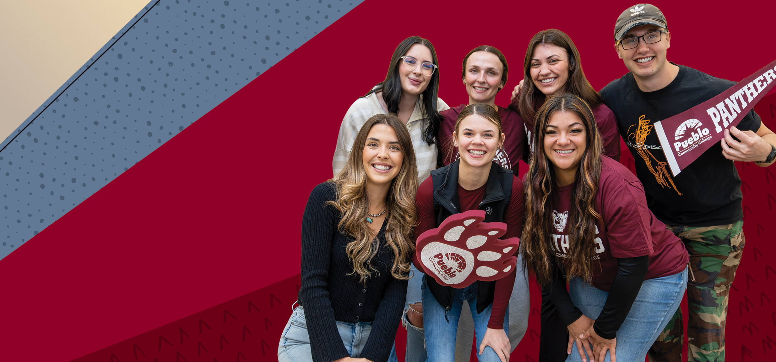 Students in a group, smiling