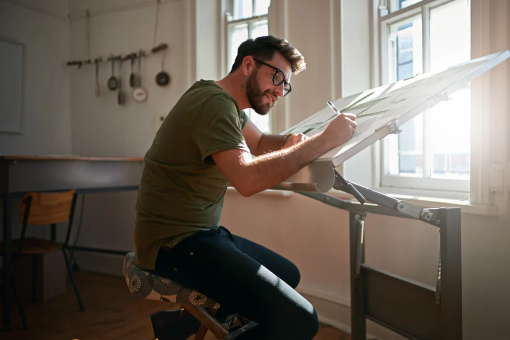 Man Working on Drafting Board