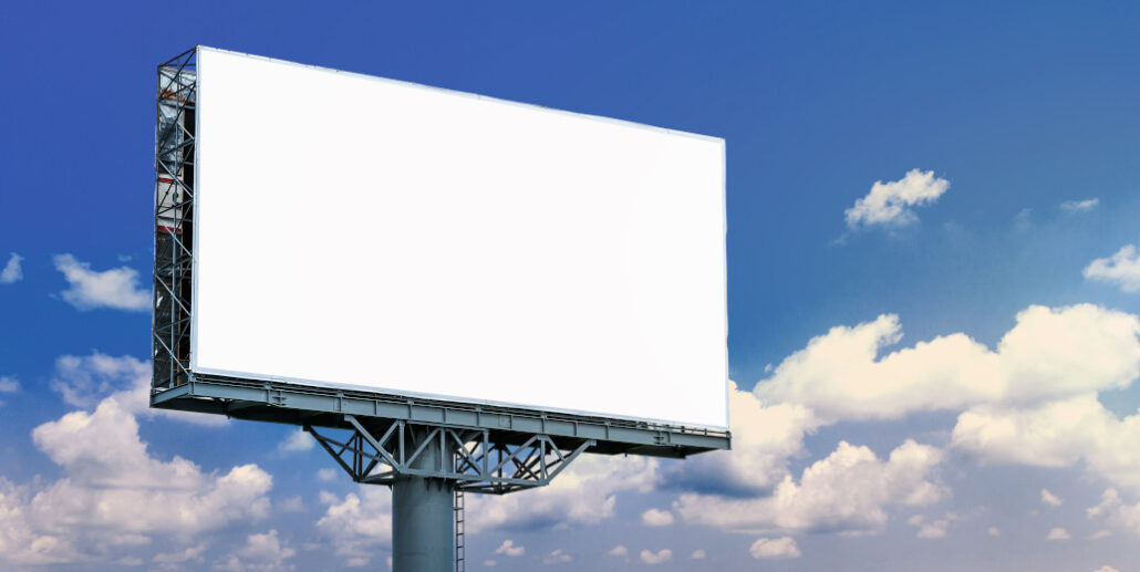 Empty billboard is displayed outside.