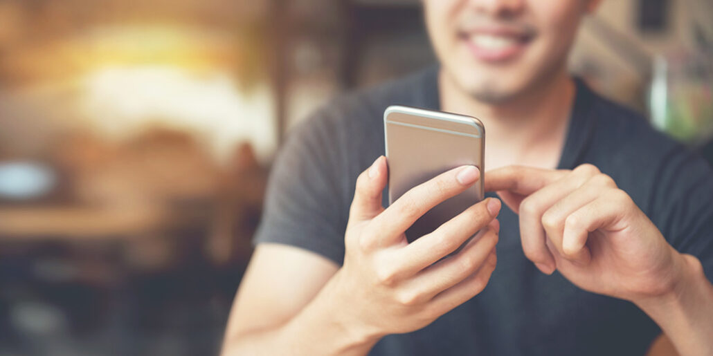 woman holding phone