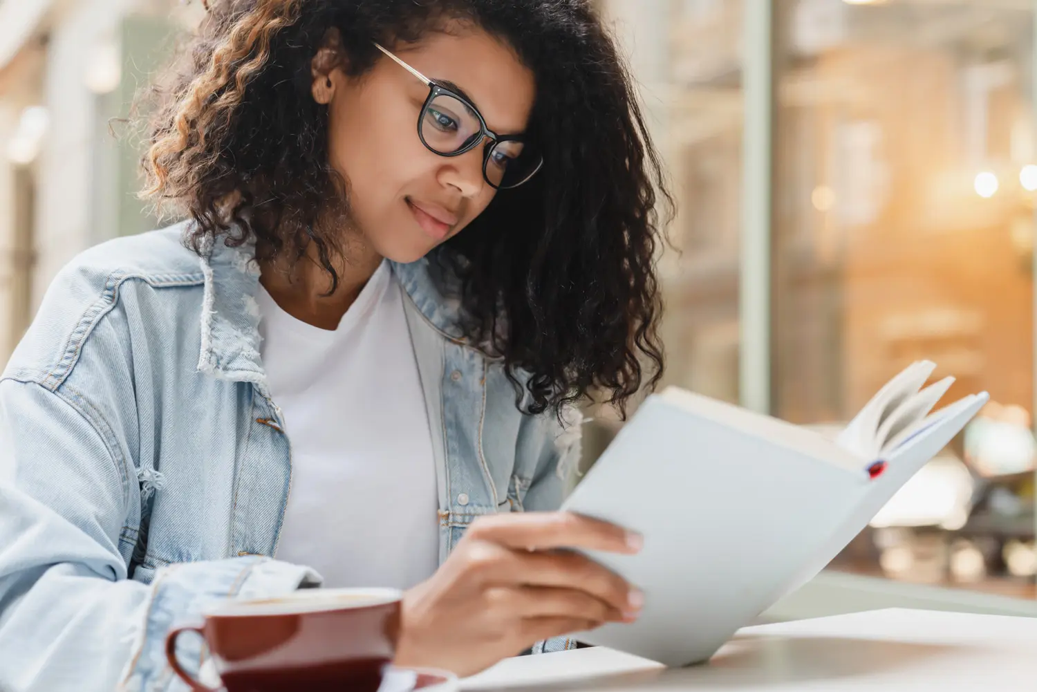 Female student reading book