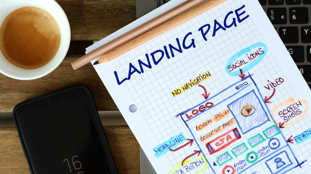 Legal pad shown with writing on it and Landing Page at the top.