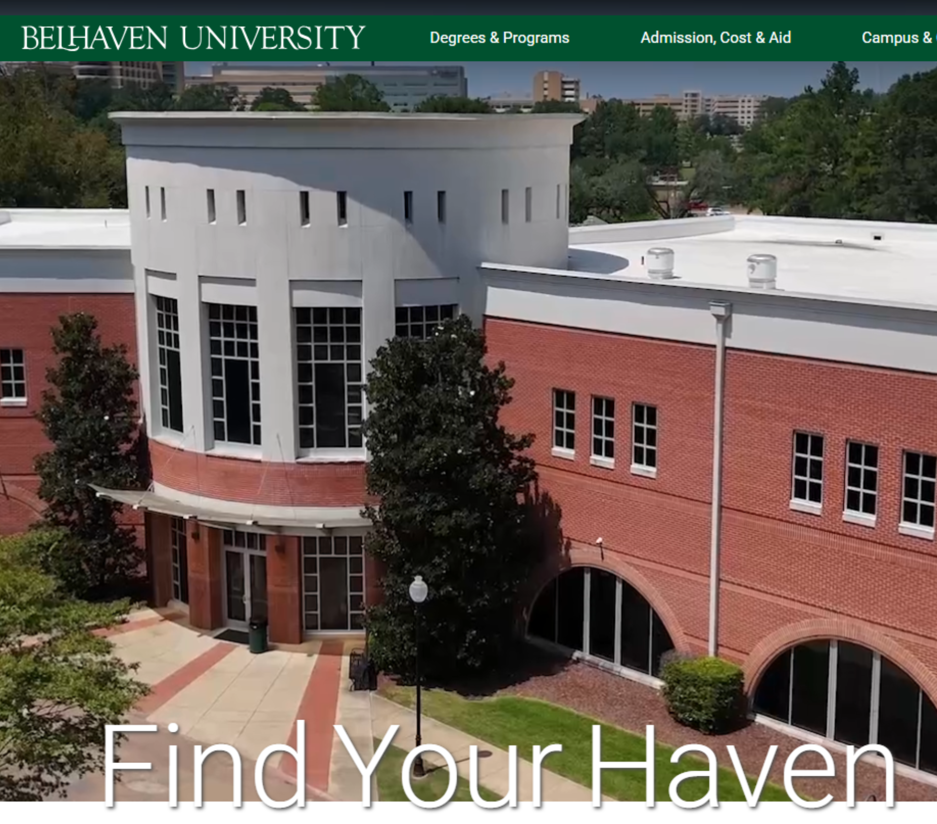 Aerial view of a red-brick and white-trimmed academic building at Belhaven University, framed by trees and walkways, with the words “Find Your Haven” overlaid at the bottom.