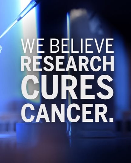 "We Believe Research Cures Cancer" ad