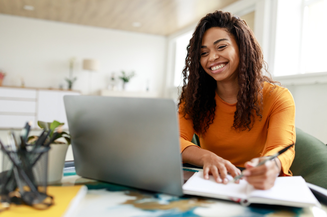 young woman using laptop
