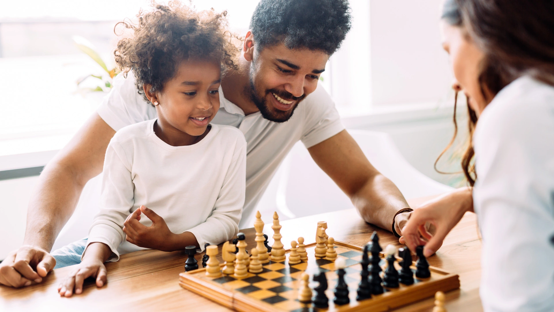 Black Family Playing Chess