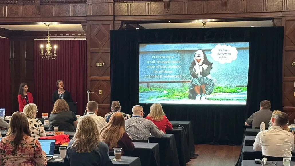 Attendees watching a marketing seminar
