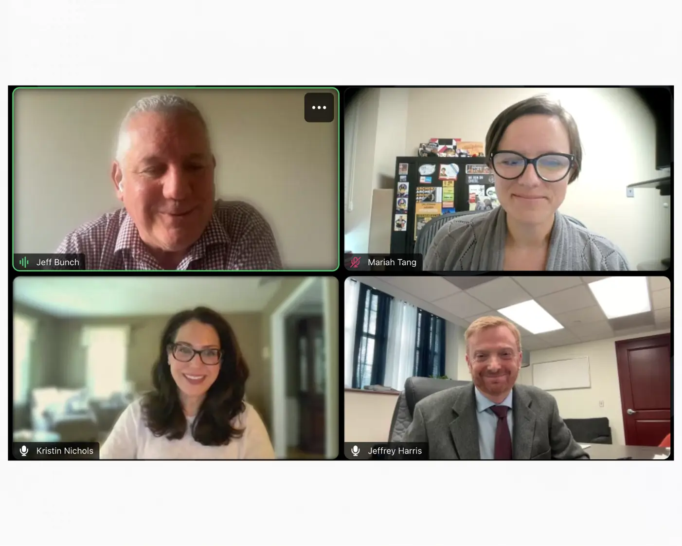 Image of four panelists smiling.