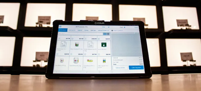 tablet displaying shopping cart software interface.